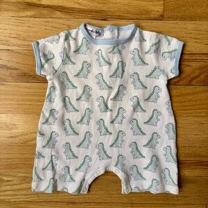 Magnolia Baby newborn onesie in dinosaur print